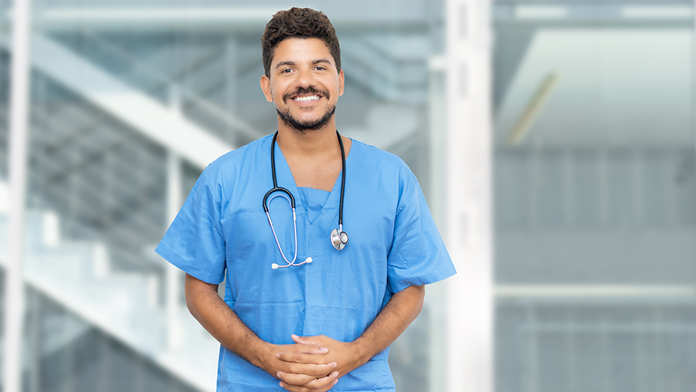 African American male doctor smiling at camera